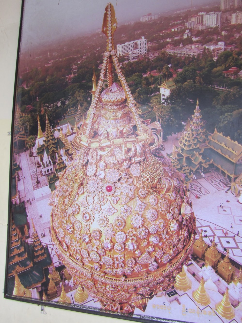 The top of the main stupa with rubies, emeralds and diamonds.